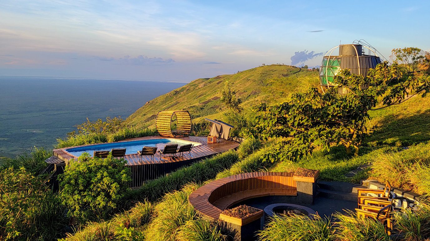 An aerial view of the swimming pool area at Aramaga Rift Valley Lodge, Kibale National Park