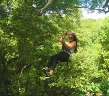 Enjoying ziplining in Uganda