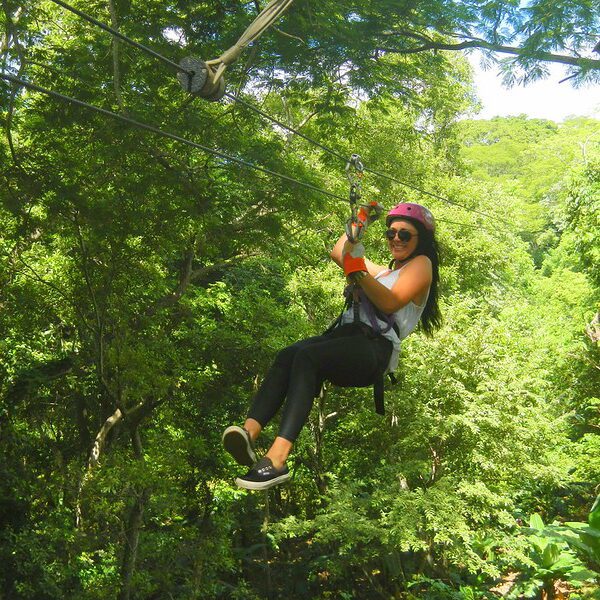 Enjoying ziplining in Uganda