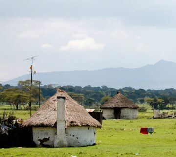 Traditional African huts in rural Kenya, showcasing authentic village architecture and cultural heritage