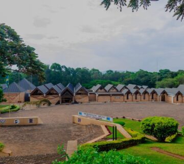Exterior view of the Ethnographic Museum in Huye, showcasing traditional Rwandan architecture and cultural significance