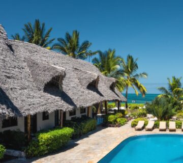 Luxury beachfront resort in Zanzibar with ocean views and palm trees