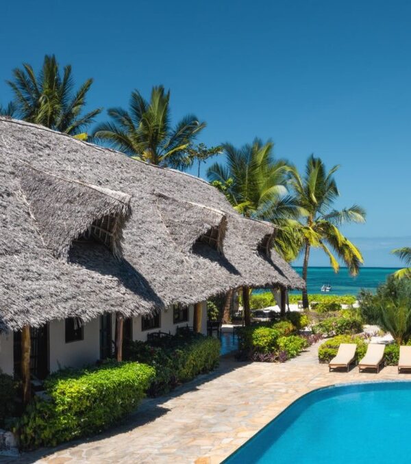 Luxury beachfront resort in Zanzibar with ocean views and palm trees