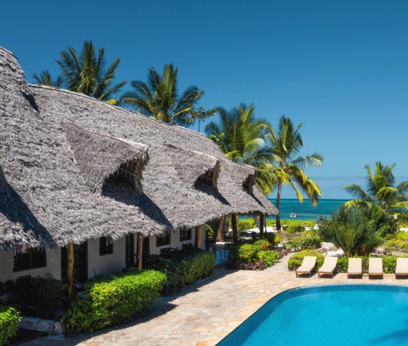 Luxury beachfront resort in Zanzibar with ocean views and palm trees
