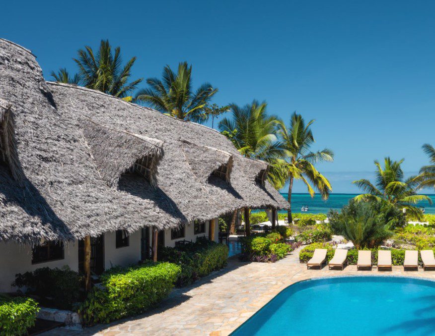 Luxury beachfront resort in Zanzibar with ocean views and palm trees