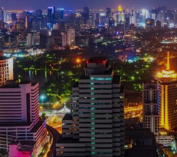 A vibrant view of Nairobi, Kenya's bustling capital, showcasing its skyline, busy streets, and urban atmosphere