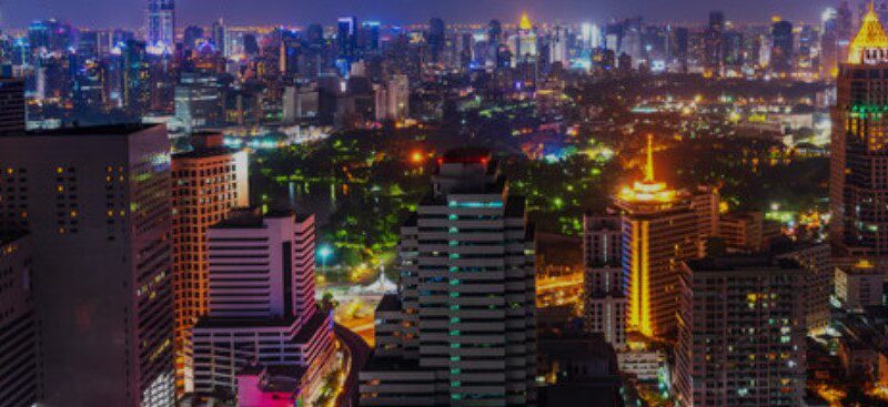 A vibrant view of Nairobi, Kenya's bustling capital, showcasing its skyline, busy streets, and urban atmosphere