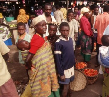 A variety of delicious street food options in Rwanda, including grilled meat, fried snacks, and fresh fruits 
