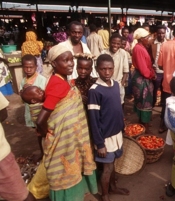 A variety of delicious street food options in Rwanda, including grilled meat, fried snacks, and fresh fruits.