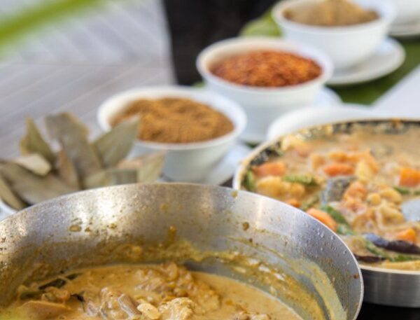 Traditional Swahili cooking dishes, including pilau, sambusa, mandazi, and chapati, showcasing vibrant, flavorful East African cuisine