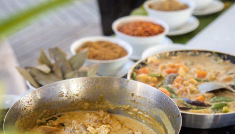 Traditional Swahili cooking dishes, including pilau, sambusa, mandazi, and chapati, showcasing vibrant, flavorful East African cuisine