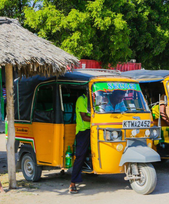 Taxi app booking screen showing ride options in Kenya.