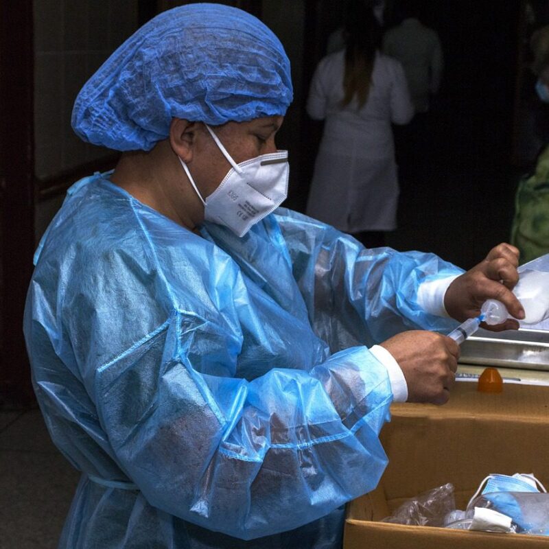 Modern hospital building near a national park entrance, ensuring emergency medical care for travelers and tourists.