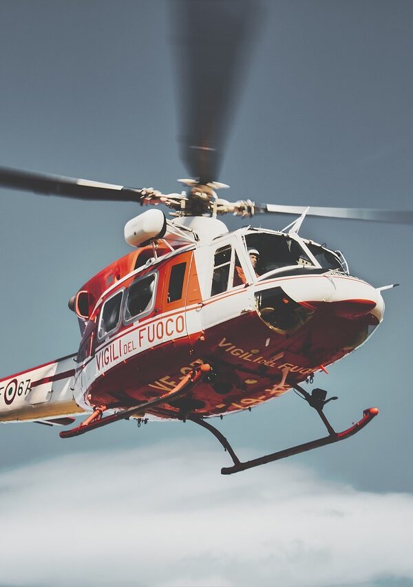 Helicopter traveling over Kenya’s stunning landscapes, offering a bird’s-eye view of the country’s natural beauty.