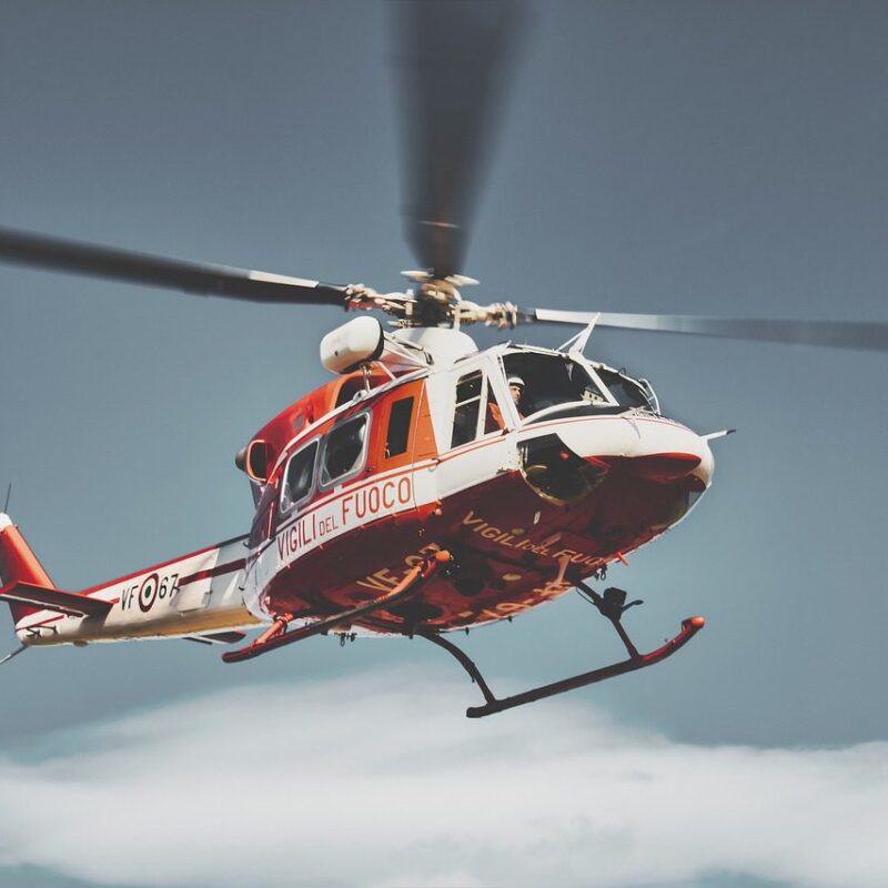 Helicopter traveling over Kenya’s stunning landscapes, offering a bird’s-eye view of the country’s natural beauty.