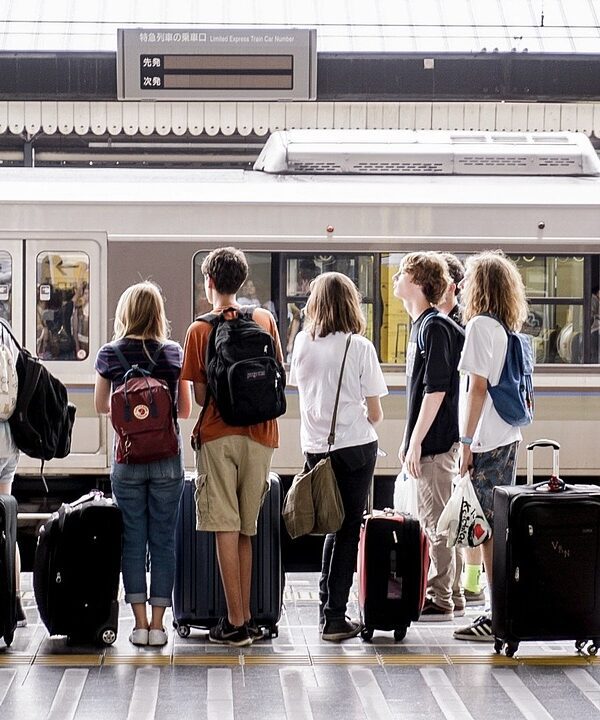 Travelers packing luggage for a safari flight, preparing for an adventurous journey through the wilderness.