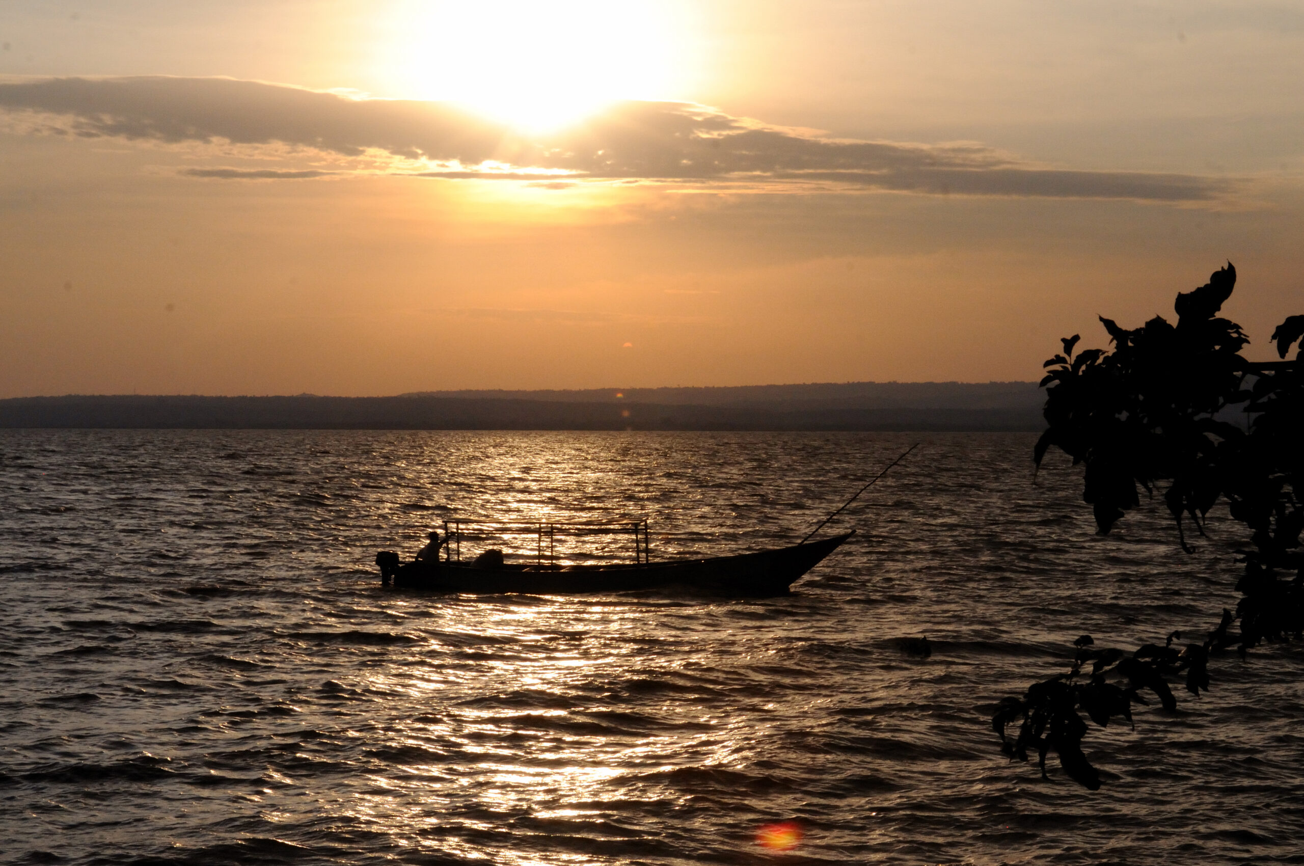 Fisherman at sunset, best shore fishing spots in Tanzania