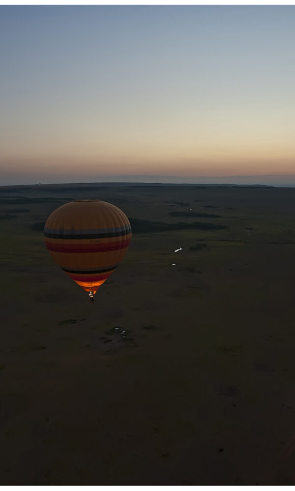 Hot air balloon over Masai Mara at sunrise, Kenya