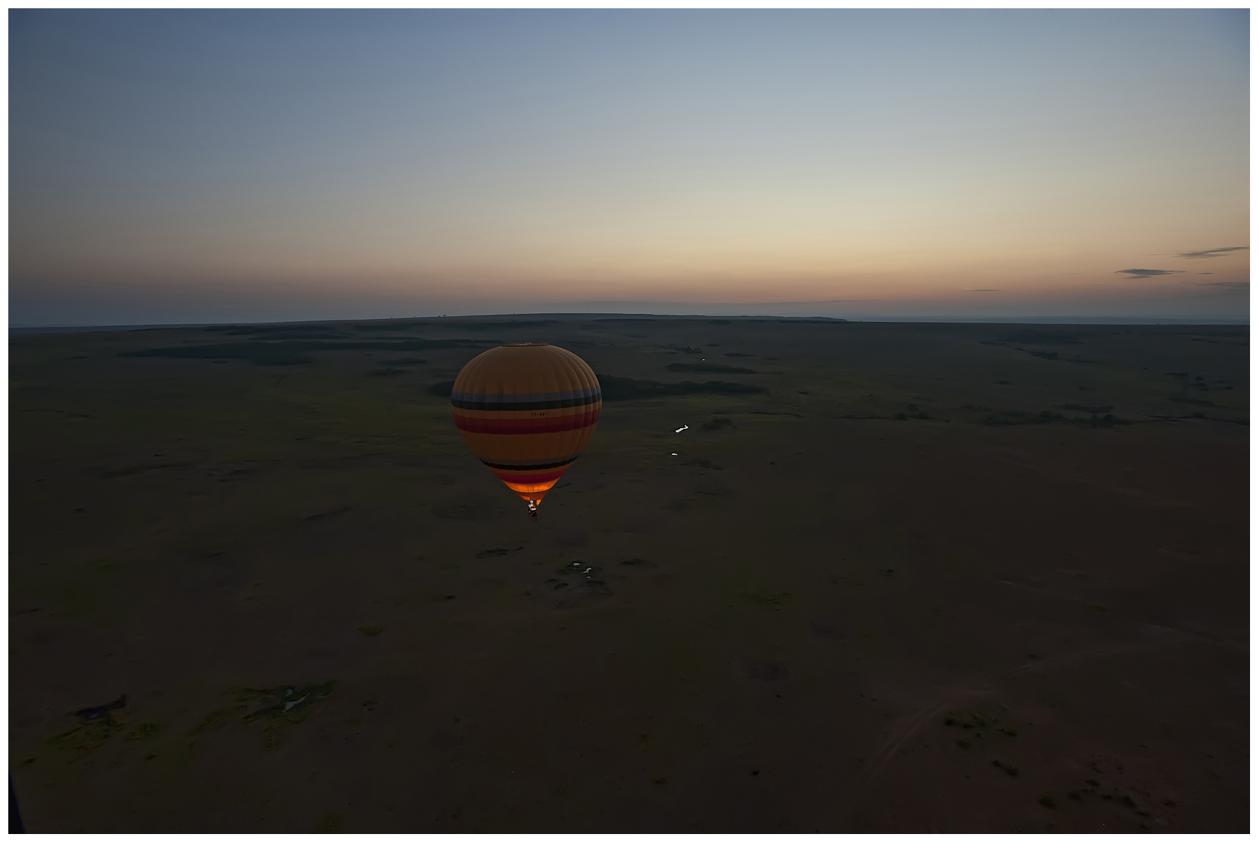 Hot air balloon over Masai Mara at sunrise, Kenya