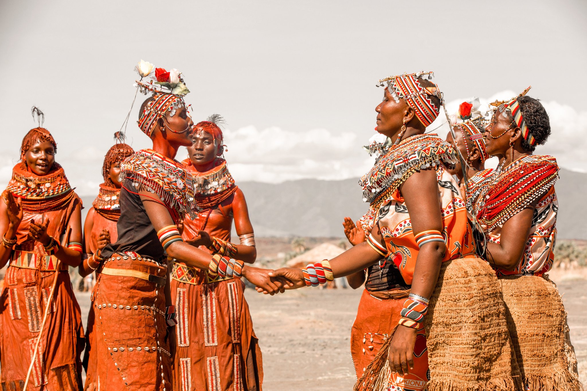 Colorful East African birds gathered during a vibrant birding festival celebration in nature