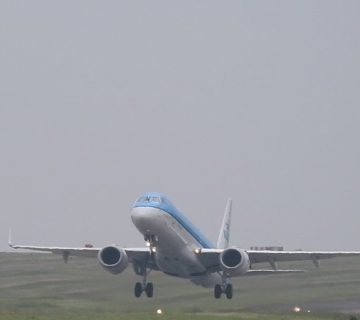 Aircraft landing, representing a flight into Entebbe International Airport