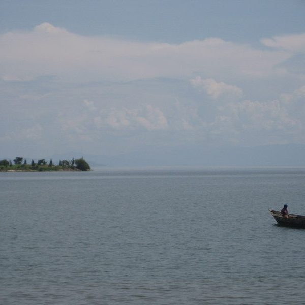 Small boat on Lake Kivu near the Rwanda DRC border region