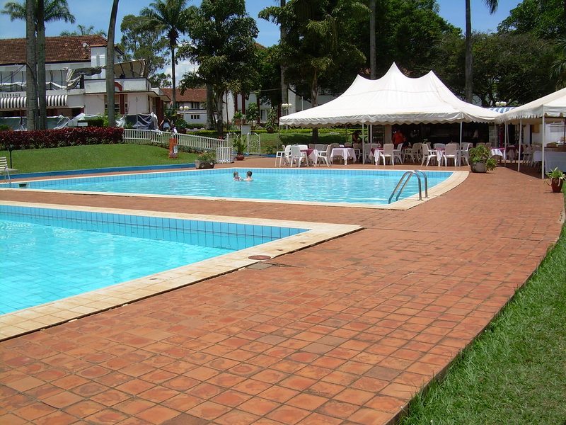 Entebbe Hotel for Group Safaris Poolside area at an Entebbe hotel suited to group safari travelers
