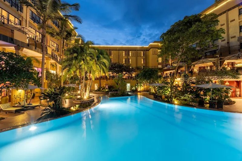 Evening view of a hotel courtyard and pool in Kigali, Rwanda