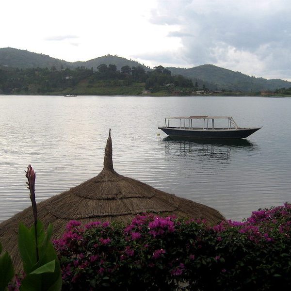 Traditional boat on Lake Kivu with hills in the background, Rwanda