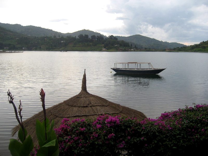 Traditional boat on Lake Kivu with hills in the background, Rwanda