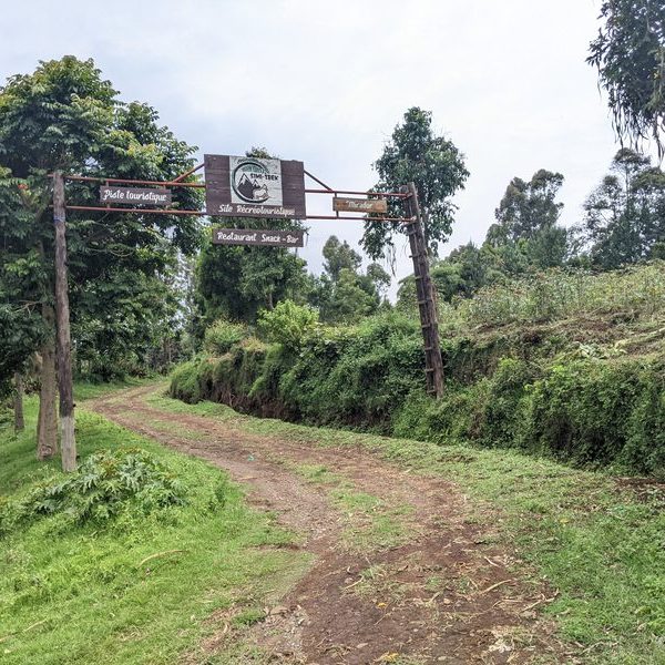 Trailhead sign at the start of the Nyiragongo volcano trek in eastern DRC