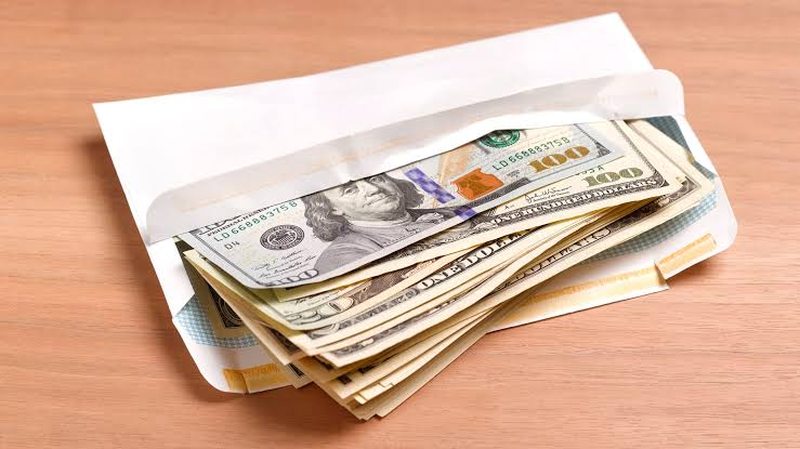 US dollar bills, the preferred currency for many larger Tanzania travel expenses
