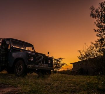 Dusk falling over a safari vehicle near Tarangire, Tanzania