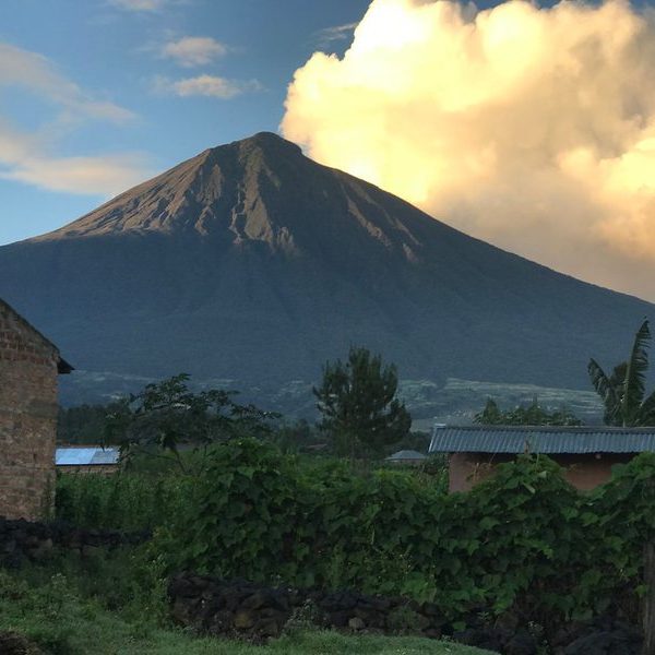 A volcanic peak rising above the landscape at Volcanoes National Park, Rwanda