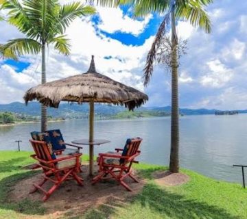 Sandy Lake Kivu beach with palm trees and beautiful waterfront scenery in Gisenyi, Rubavu, Rwanda 